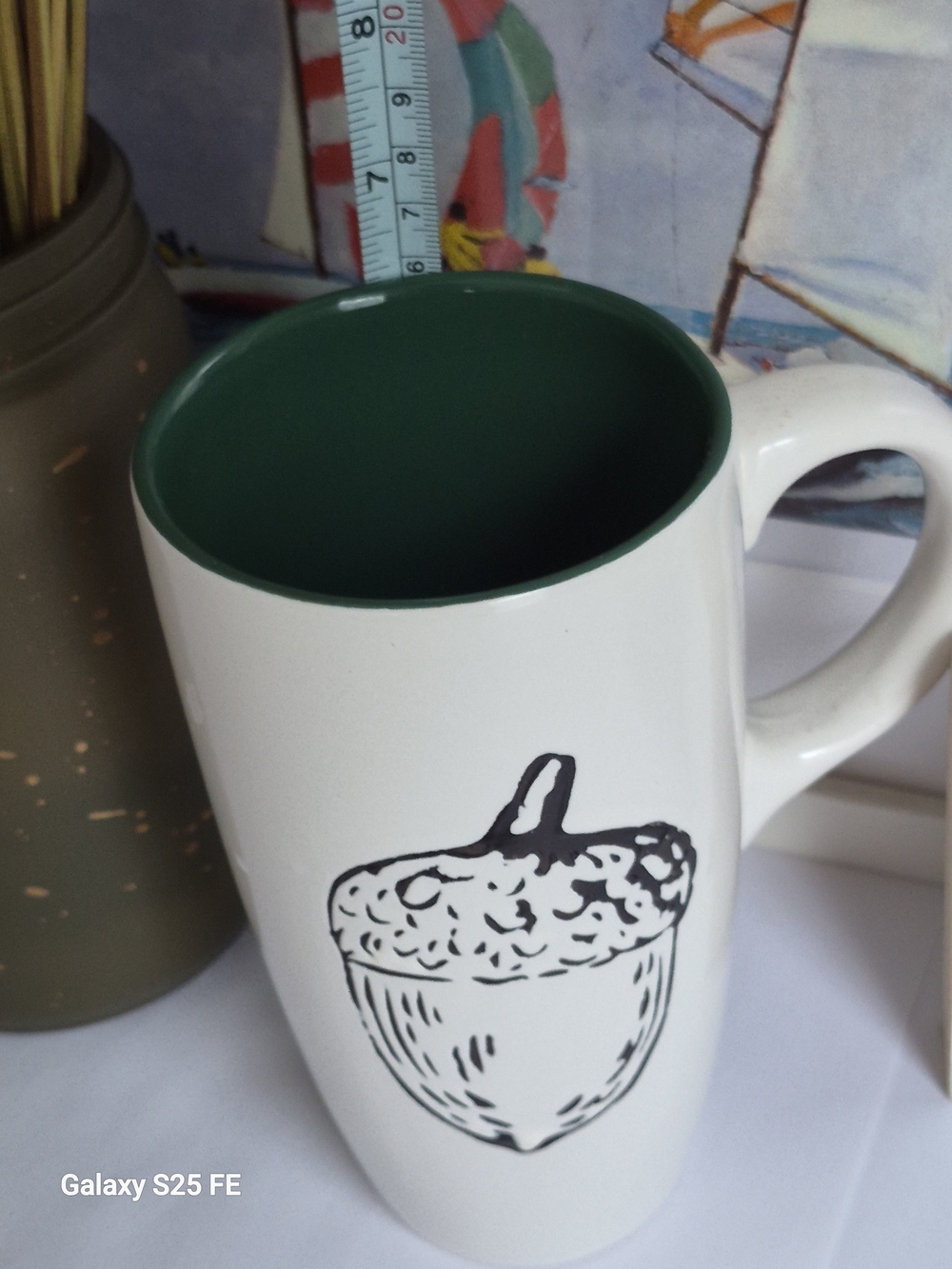 White Ceramic Artisan Mug with Green Interior and Acorn Graphic Acsent